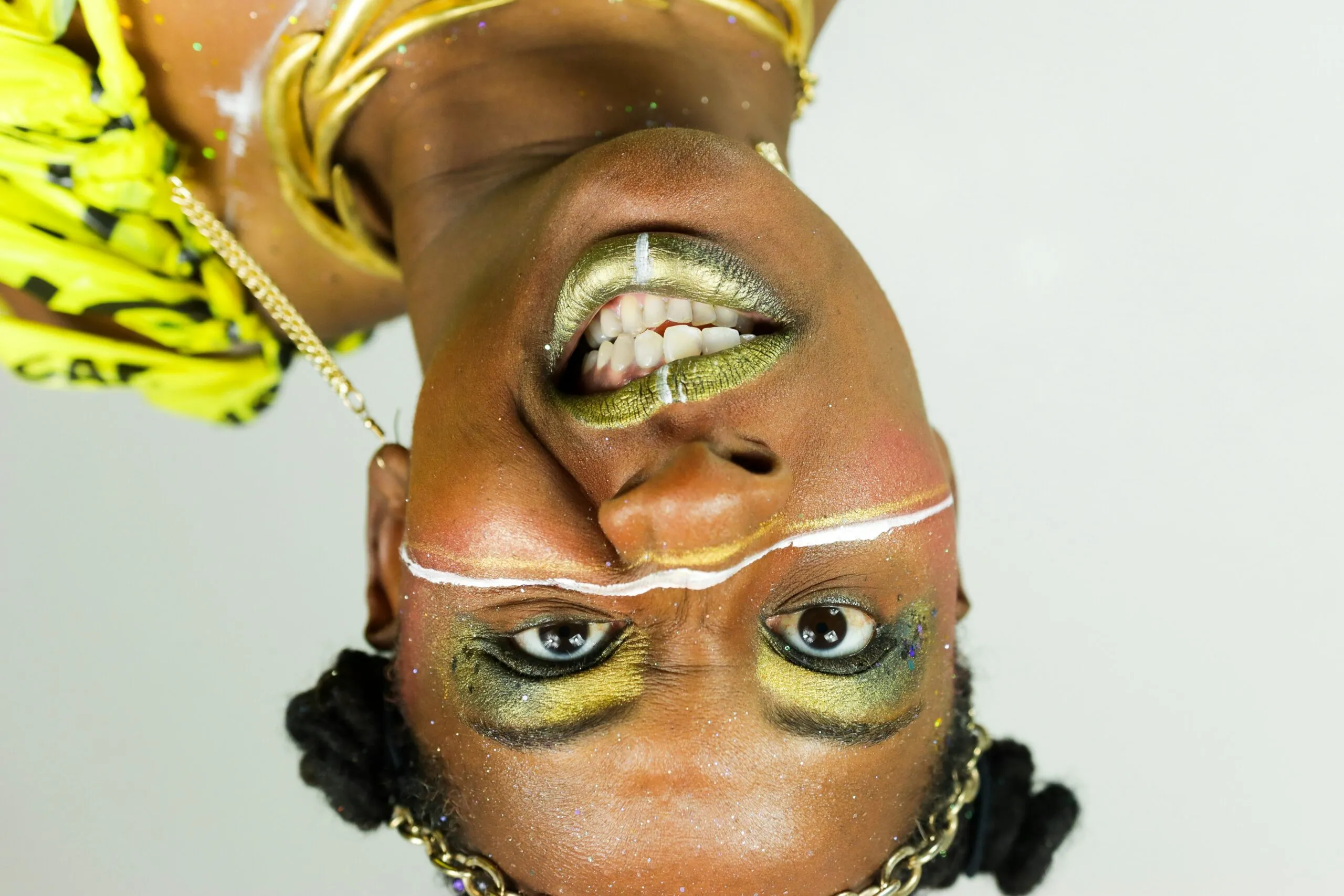 Woman with vibrant makeup and festive attire