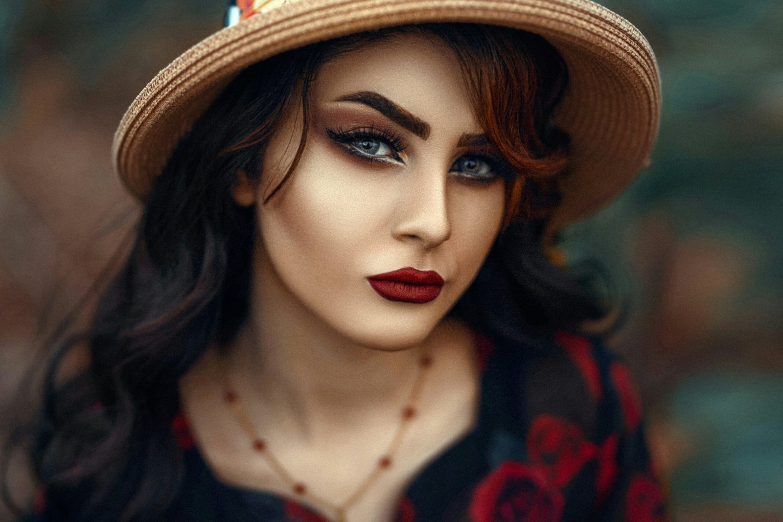 a close up of a woman wearing a hat