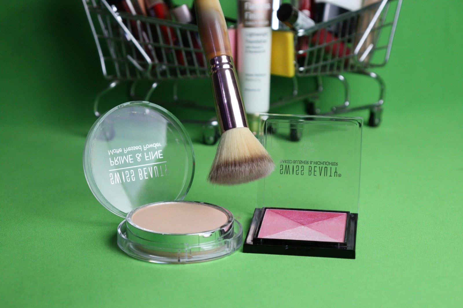 A green background with a shopping cart and cosmetics