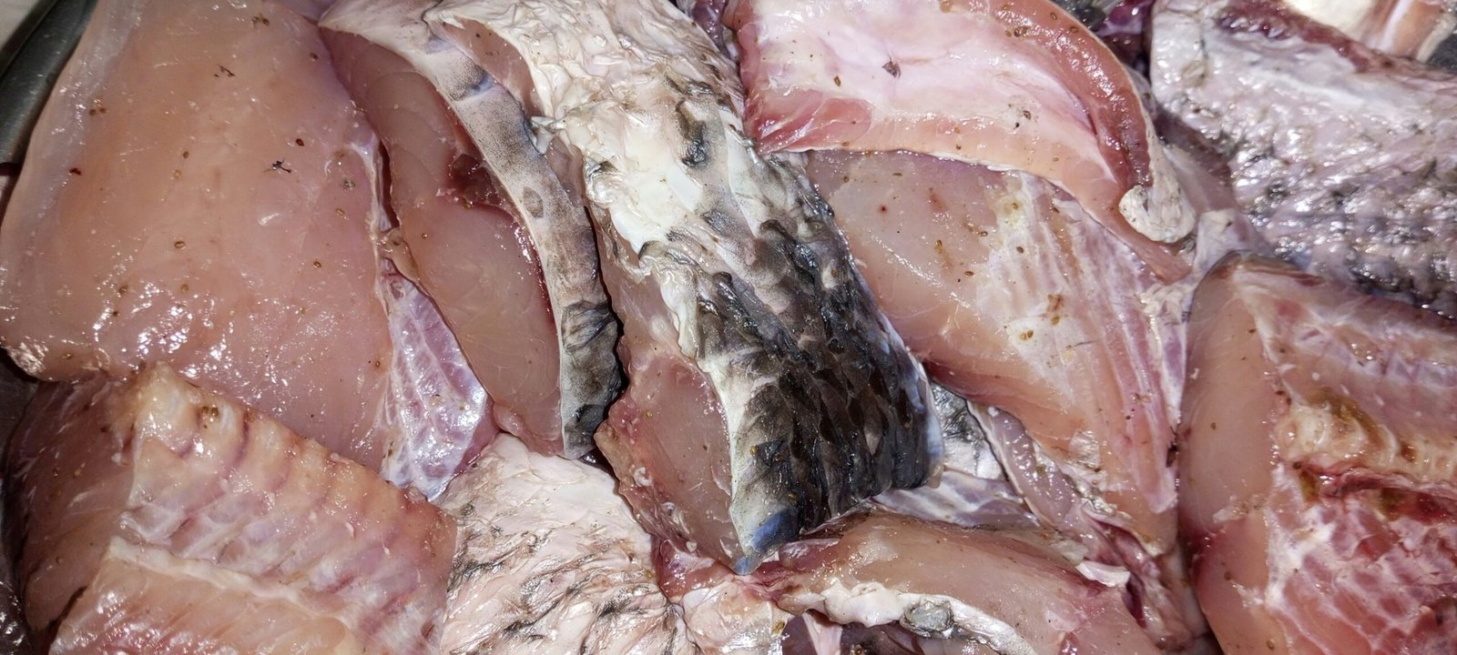 A pile of meat sitting on top of a table