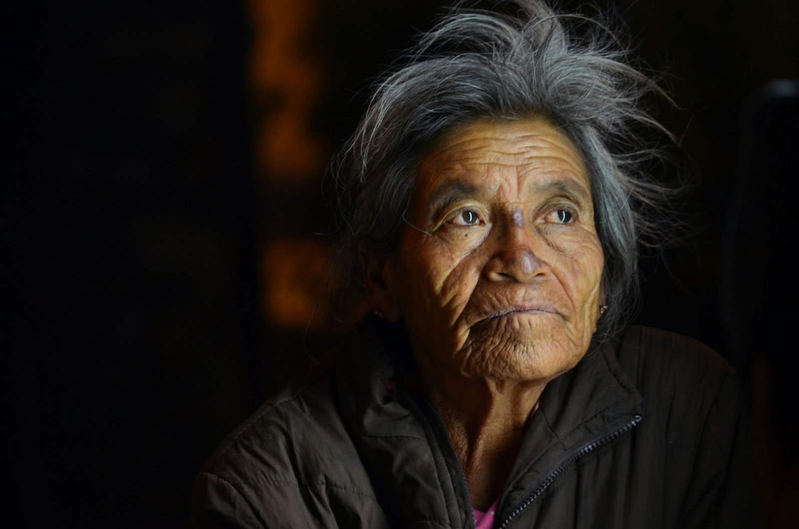 woman wearing black zip jacket