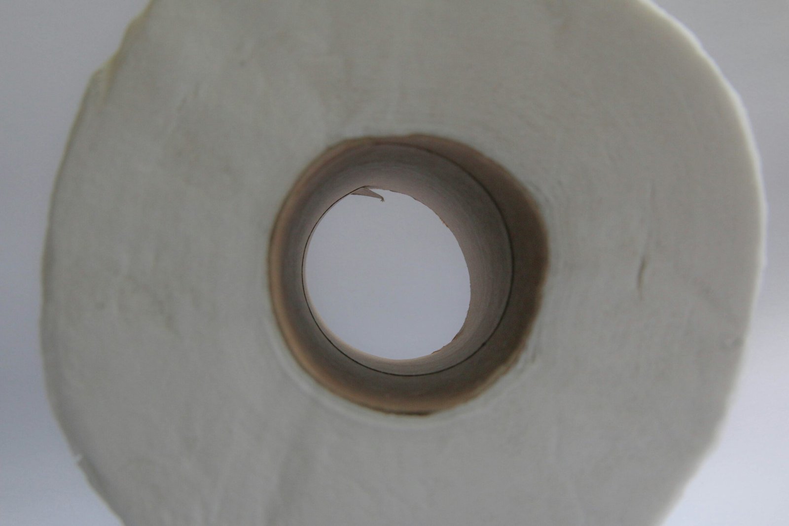 brown round hole on white paper