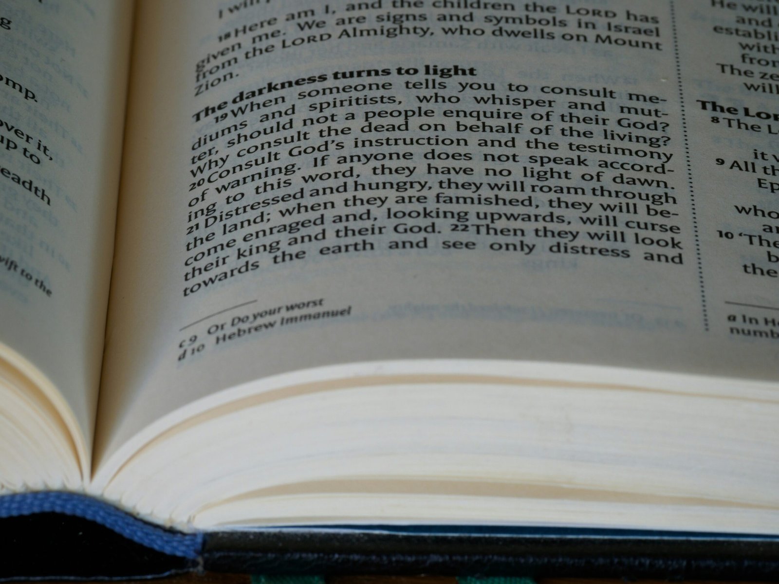 a close up of an open book on a table