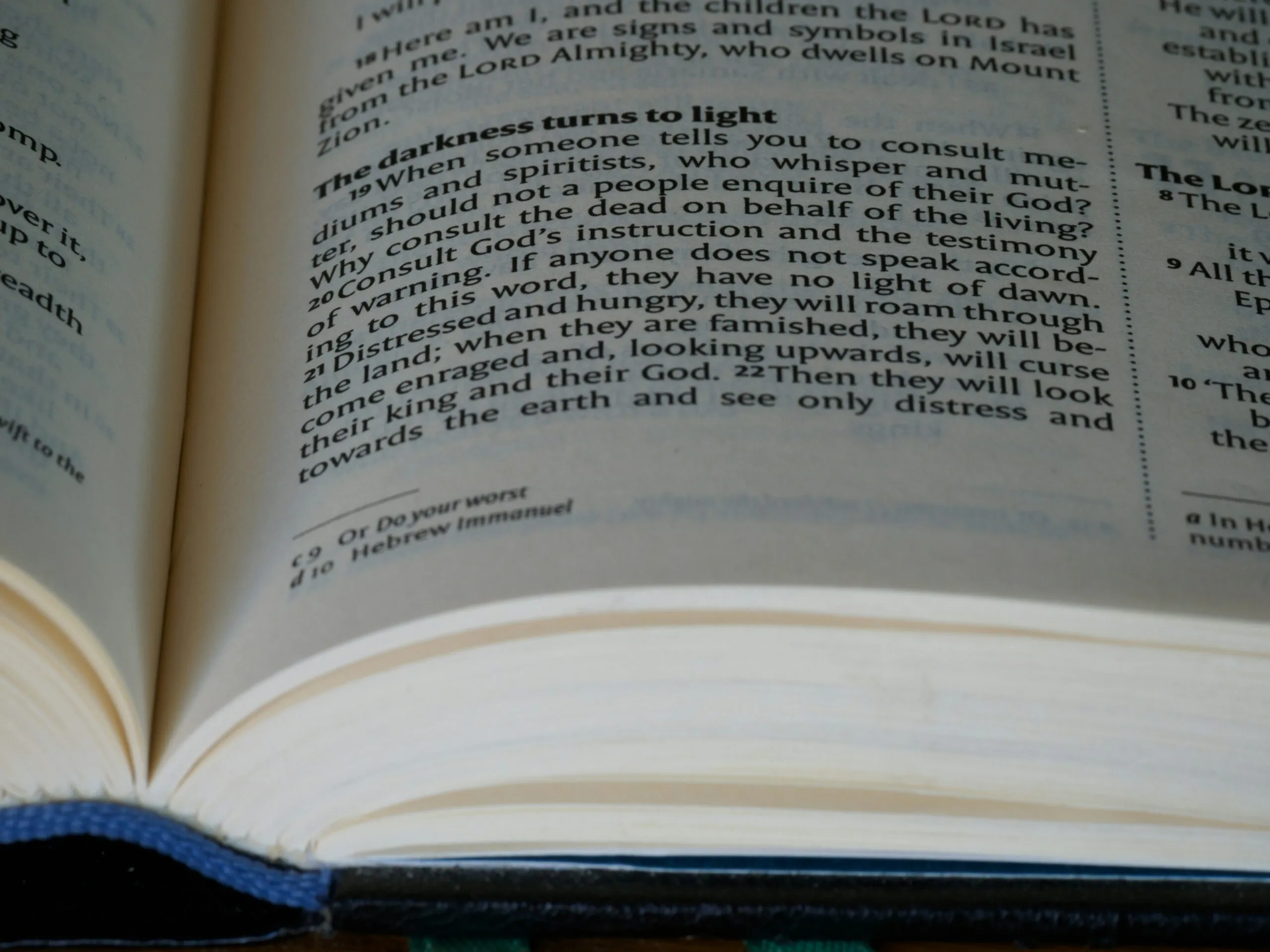 a close up of an open book on a table