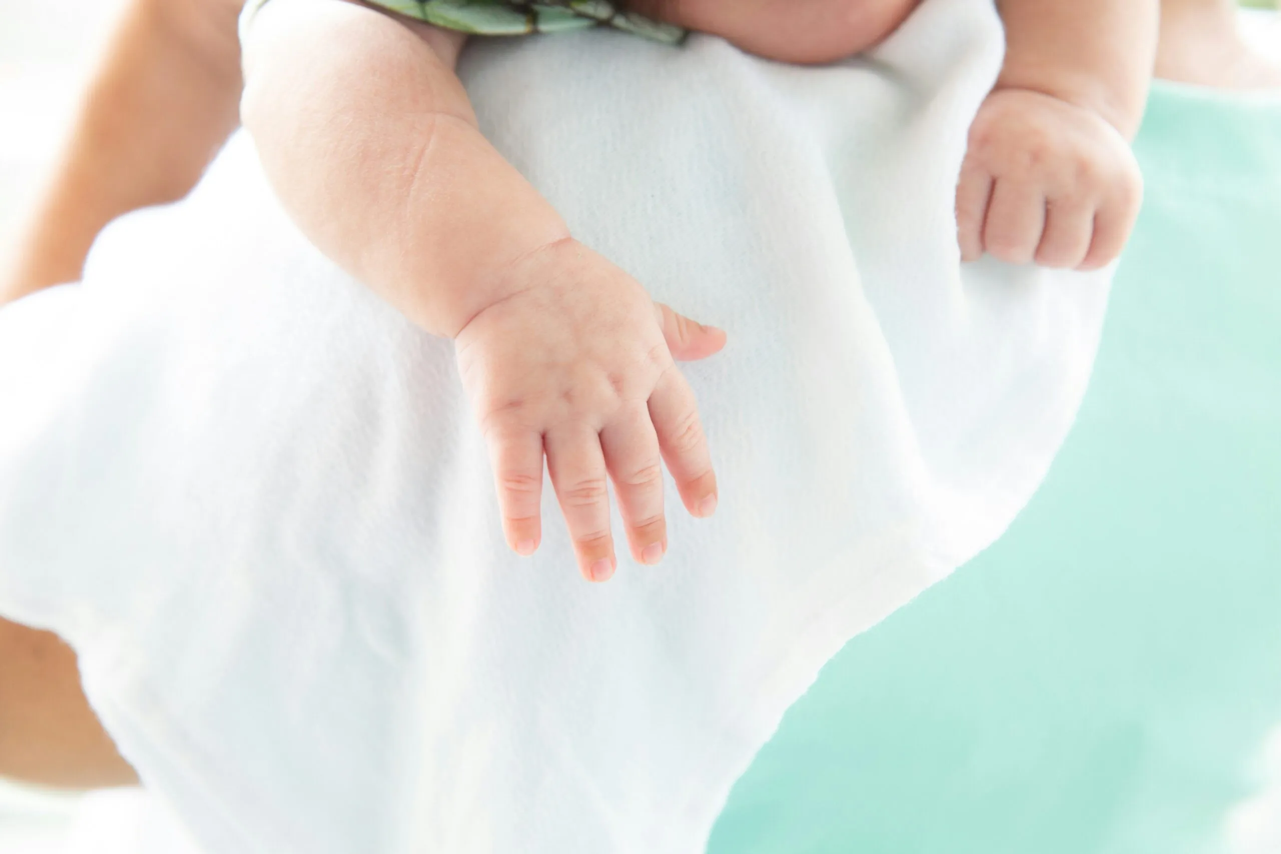a close-up of a person holding the belly