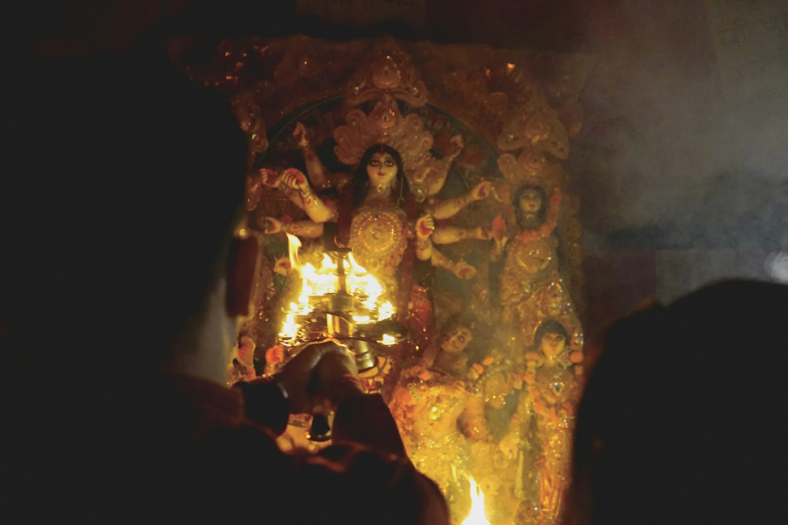 a group of people around a fire