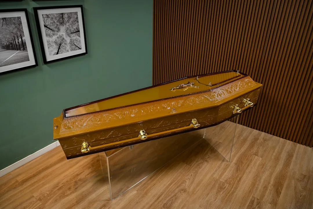 A wooden trunk sitting on top of a wooden floor