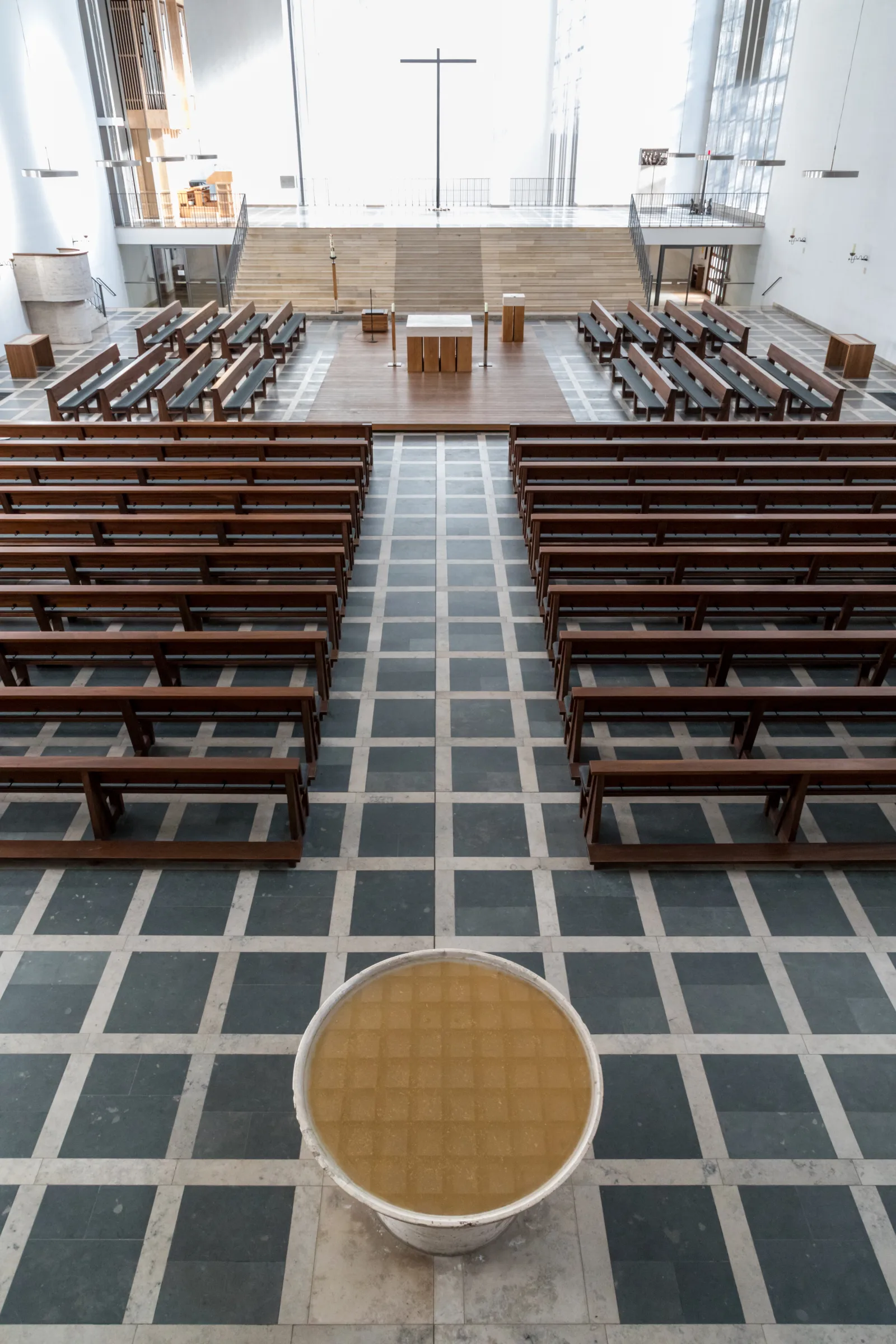 Interior of the Holy Cross Church, Dülmen, North Rhine-Westphalia, GermanyThe Holy Cross Church is a Roman Catholic parish church that houses the tomb of the blessed mystic Anna Katharina Emmerick. It was built between 1936 and 1938 on Lüdinghauser Straße by church architect Dominikus Böhm as the second Catholic parish church and was consecrated on November 16, 1938, by the then Bishop of Münster, Clemens August Graf von Galen, as the last new church to be built in Germany before the Second World War. The church was partially destroyed by bombs on March 22, 1945. The building was rebuilt by 1953, although the baptistery was not rebuilt. The church was renovated and redesigned in the 1970s and 2000s.