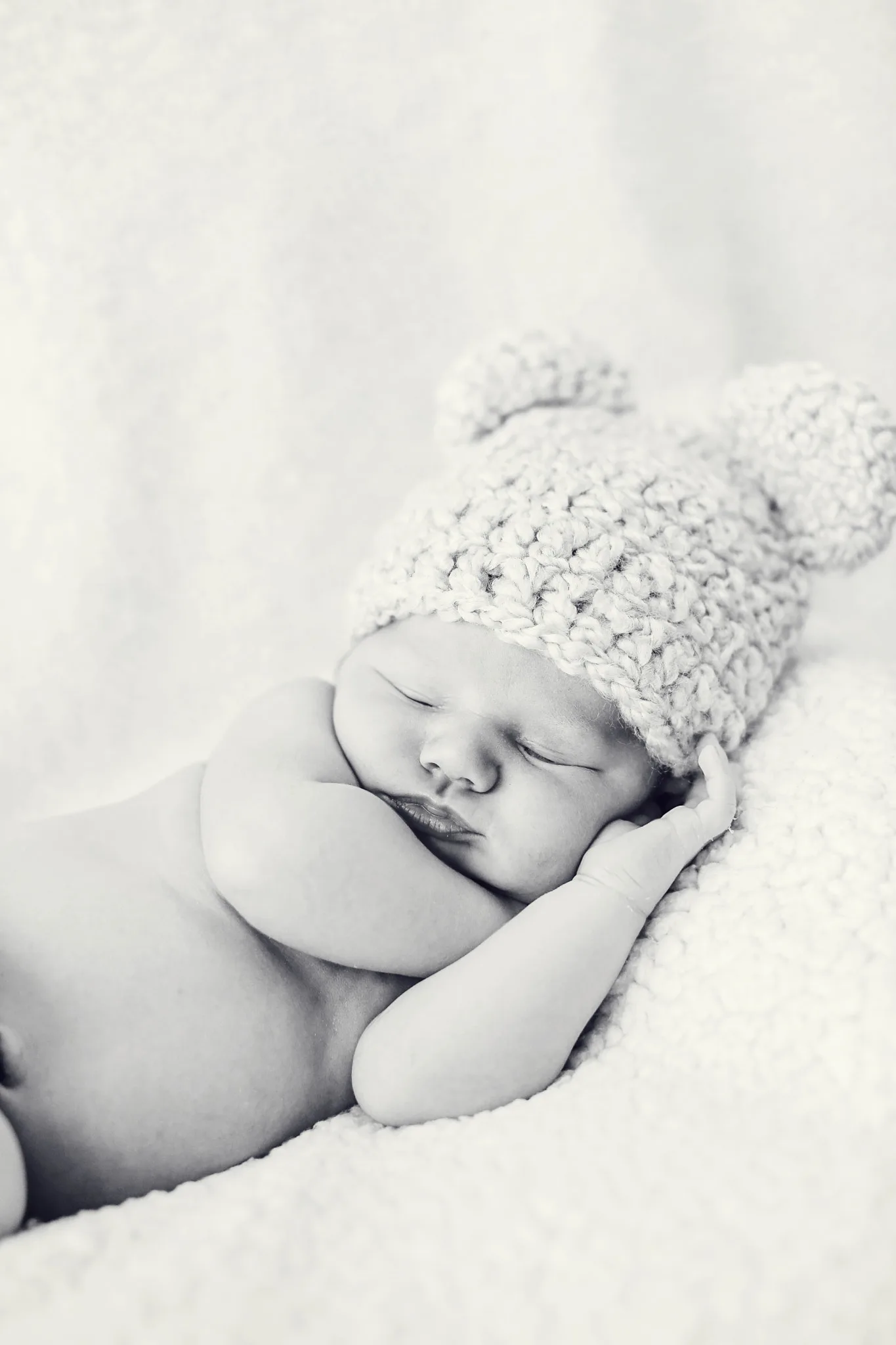 
500px provided description: Loved this cuddly newborn baby boy [#Baby ,#Boy ,#Sleeping ,#Newborn ,#Bear hat ,#TEddy bear]