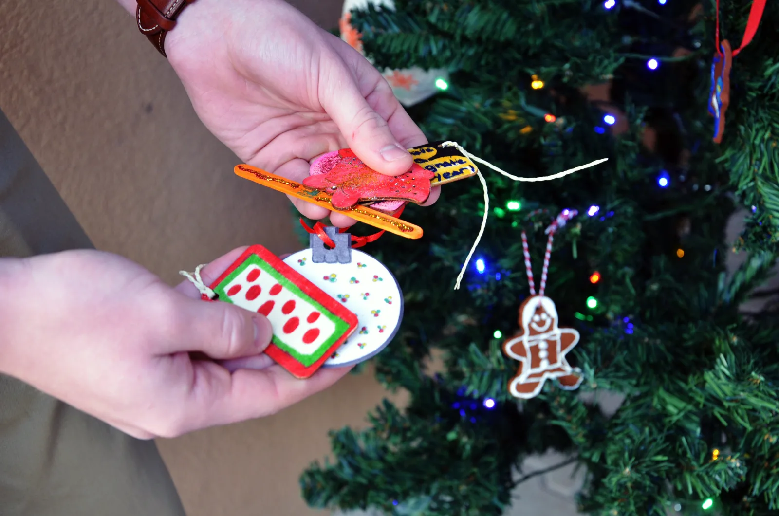 VICENZA, Italy - Casey Dugan, Sergeant Morales Club member, holds some of the one hundred homemade ornaments created by many children in the community to decorate the eight Christmas trees to deliver to Villaggio Army Family Housing.
Girl Scouts, Cub Scouts, Club Beyond, Vicenza Elementary School and High School completed the ornaments and cards by Dec. 18, 2020.