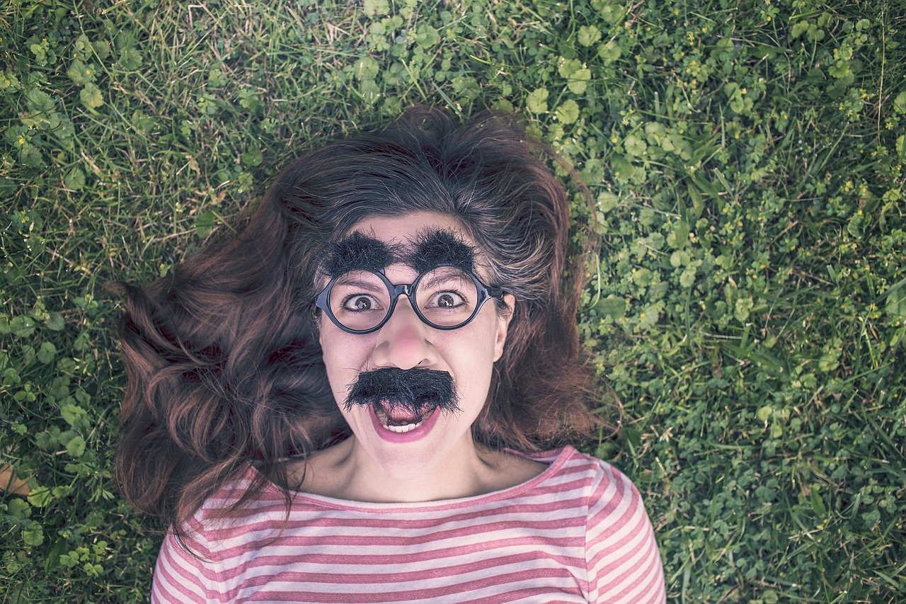 grimace, funny, expression, mask, happy, queer, people, portrait, person, emotion, fun, adult, man, human, hair, face, head, happiness, cheerful, grass, girl, woman, glasses, frames, brunette, eyebrows, moustache, green happy, green grass, green funny, green portrait, nature, green glass, green frame, green hair, green human, green glasses, green happiness, green fun