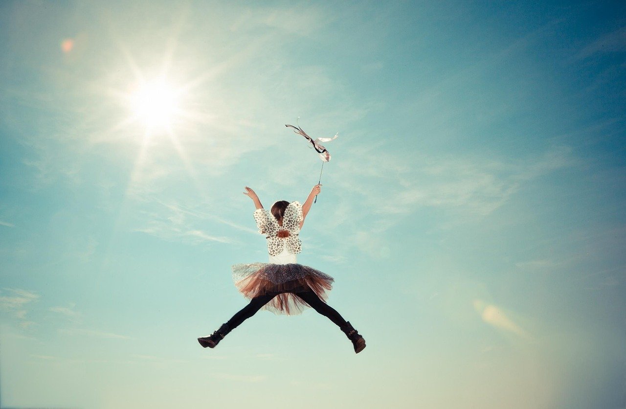 child, costume, fairy, fly, girl, heaven, jump, nature, sunlight, motion, outdoors, sky, sun, happy, jumping, fairy costume