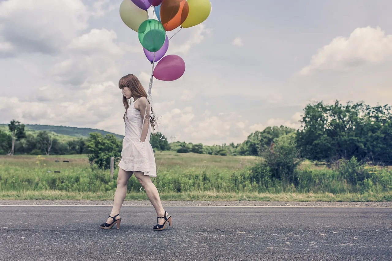 balloons, girl, walking, street, celebration, bunch, colors, woman, high heels, dress, legs, redhead, hair, country, road, happy birthday, grass, nature, fields, trees