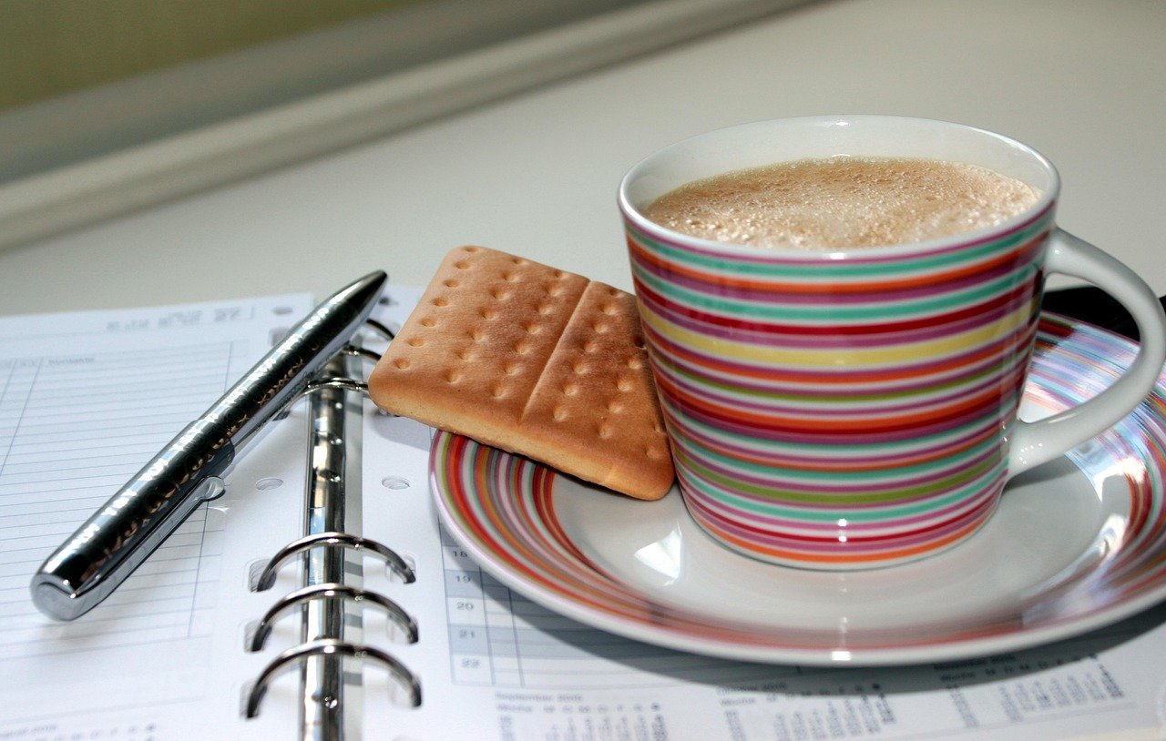 cup of coffee, appointment calendar, coffee break, cookie, enjoy, coffee enjoyment, break, workplace, ballpoint pen, coffee pot, drink coffee, hot, aromatic