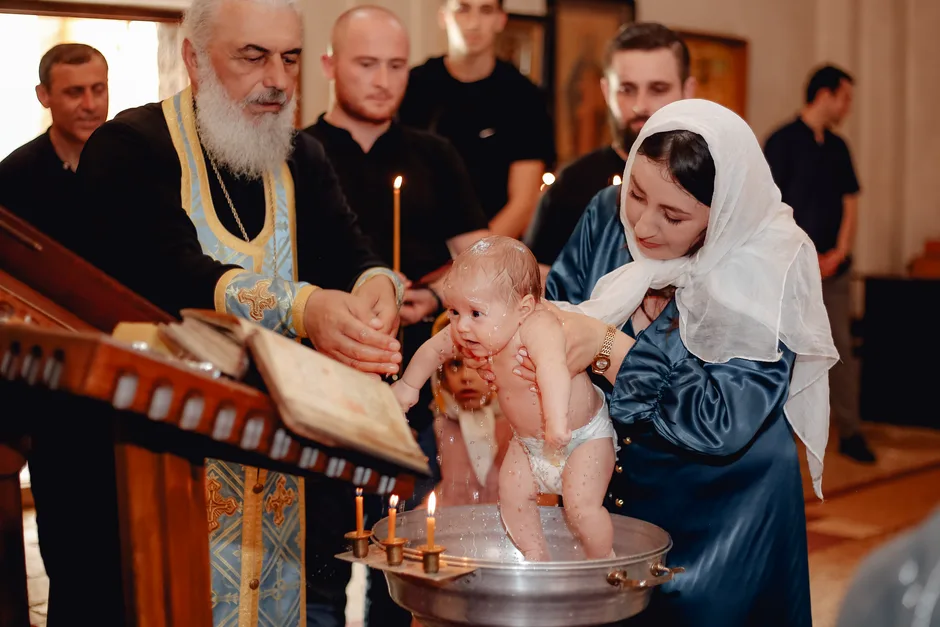 A serene moment depicting a traditional Christian baby baptism ceremony in a church.