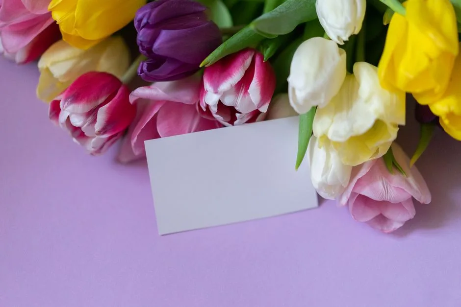 Vibrant tulips bouquet with blank card for personalized message.