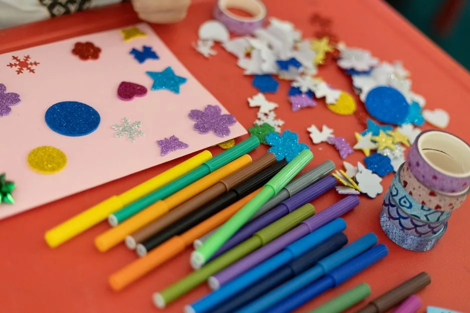 A vibrant assortment of arts and crafts materials on a table, perfect for creativity and decoration projects.