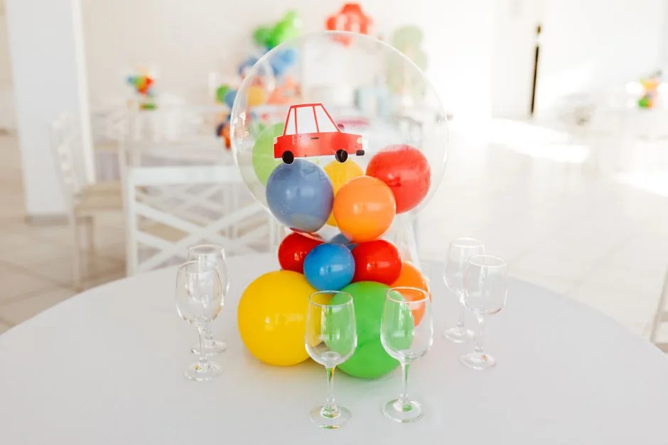 Festive kids party setup featuring colorful balloons and glassware, captured with a Canon EOS R5 camera.