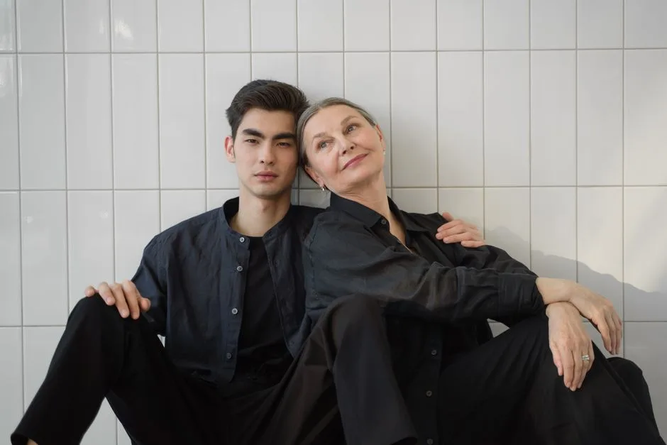 A touching portrait of a mother and son embracing at home, showcasing warmth and togetherness.