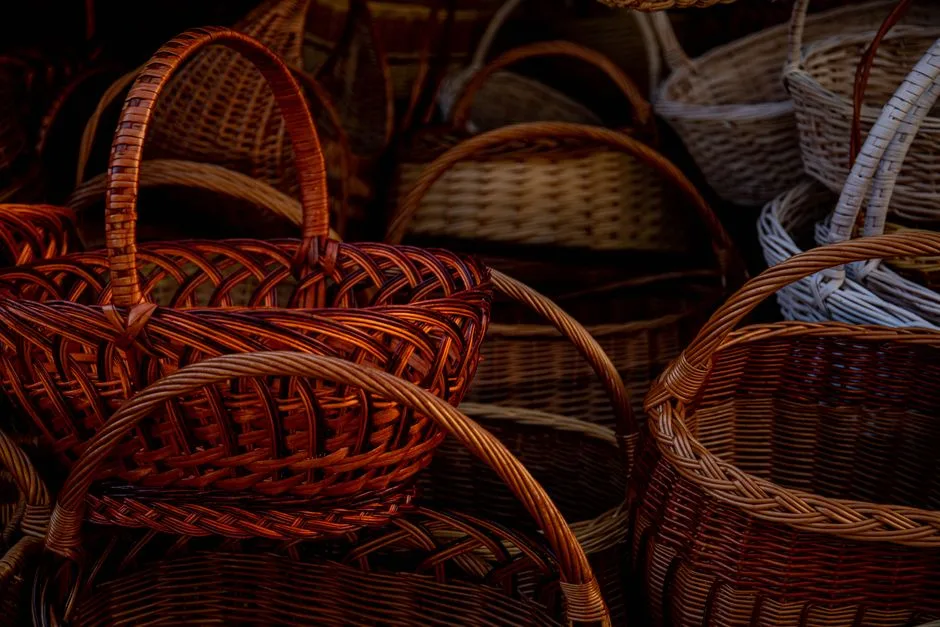 A close-up view of handcrafted wicker baskets showcasing intricate weaving patterns.
