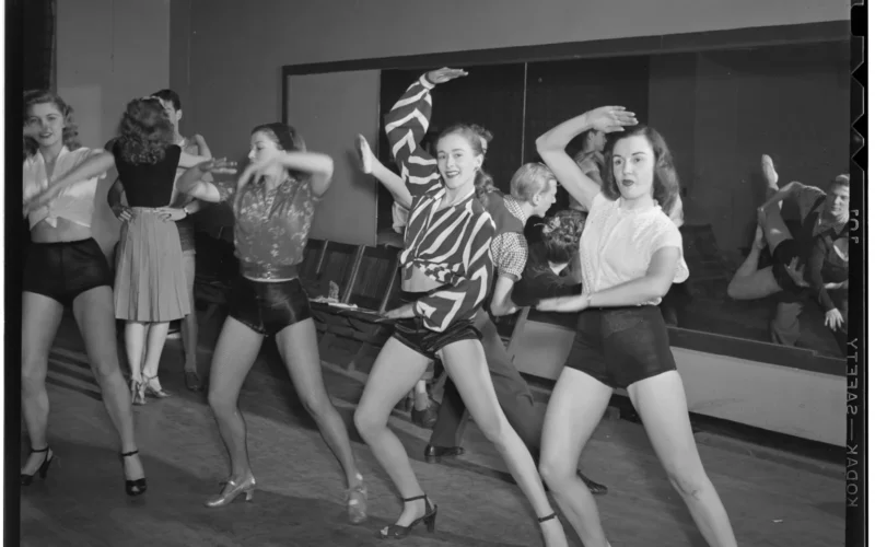 Gottlieb, William P., 1917-, photographer. [Dancers, Nola's, New York, N.Y., ca. Feb. 1947] 1 negative : b&w ; 3 1/4 x 4 1/4 in. Caption from Down Beat: Girls in the line at the Vanity Fair rehearsing routine before opening. These beauties catch much eye as they walk around the studios in shorts. Notes: Gottlieb Collection Assignment No. 261 Purchase William P. Gottlieb Forms part of: William P. Gottlieb Collection (Library of Congress). In: "Nola Studios is meeting place for NYC musicians," Down Beat, v. 14, no. 5 (Feb. 26, 1947), p. 15. Subjects: Vanity Fair Dancers--1940-1950. Nola's Format: Portrait photographs--1940-1950. Group portraits--1940-1950. Film negatives--1940-1950. Rights Info: Mr. Gottlieb has dedicated these works to the public domain, but rights of privacy and publicity may apply. lcweb2.loc.gov/diglib/ihas/html/gottlieb/gottlieb-copyrig... Repository: (negative) Library of Congress, Prints & Photographs Division, Washington D.C. 20540 USA, hdl.loc.gov/loc.pnp/pp.print Part Of: William P. Gottlieb Collection (DLC) 99-401005 General information about the Gottlieb Collection is available at lcweb2.loc.gov/diglib/ihas/html/gottlieb/gottlieb-home.html Persistent URL: hdl.loc.gov/loc.music/gottlieb.14511 Call Number: LC-GLB13- 1451 Public domainPublic domainfalsefalse This work is from the William P. Gottlieb collection at the Library of Congress. Rights and restrictions.In accordance with the wishes of William Gottlieb, the photographs in this collection entered into the public domain on February 16, 2010.