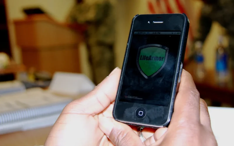 A SHARP student uses a smart phone to find the free app Life Armor. Life Armor is a comprehensive learning and self development tool to assist service members with common mental and behavioral health concerns. Sleep, depression, relationship issues and post traumatic stress are a few of the 17 topics listed. After selecting a specific topic you can get information in one of four areas: learn, assess, tools and videos.