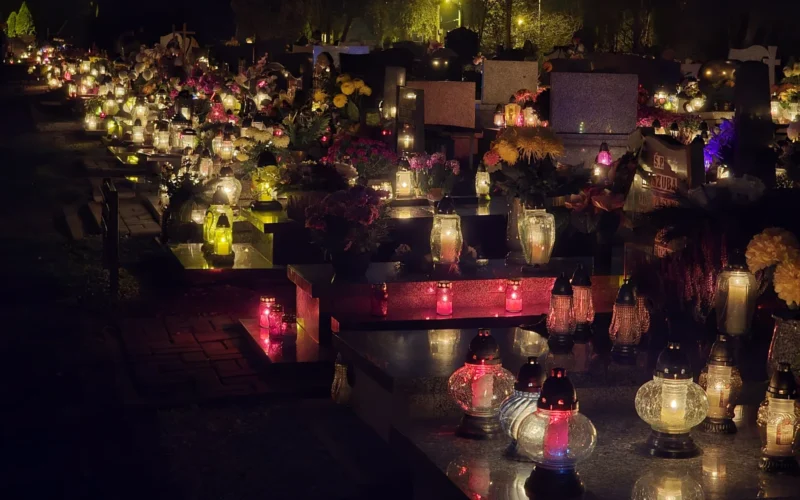 Graves in a Polish cemetery, decorated with candles for All Saints' Day on November 1st, Zabrze, Silesian Voivodeship, Poland, November 2024