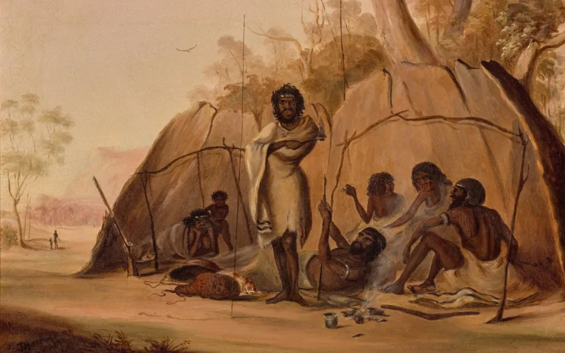 THOMAS BALCOMBE (1810 - 1861) ABORIGINAL ENCAMPMENT, 1847 oil on canvas 33.0 x 45.5 cm signed and dated lower left: T. Balcombe / 1847 PROVENANCE Private collection, United Kingdom Christie’s, London, 25 May 1983, lot 177 (as ,A Group of Aborigines Gathered Around a Camp Fire,) Private collection, Melbourne EXHIBITED Australian Paintings Colonial/Contemporary, Deutscher Fine Art, Melbourne, 2 – 19 April 1984, cat. 5 (illus. in exhibition catalogue) The Artist and the Patron, Art Gallery of New South Wales, Sydney, 2 March – 1 May 1988, cat. 82 LITERATURE McDonald, P., and Pearce, B., The Artist and the Patron, Art Gallery of New South Wales, Sydney, 1988, cat. 82, pp. 101 (illus.), 102 ESSAY This important painting of an Aboriginal family at rest is one of the few such oil paintings remaining in private hands. It has not been seen in public since its inclusion in the Art Gallery of New South Wales’ bicentenary exhibition of colonial New South Wales art in 1988.1 Thomas Tyrwhitt Balcombe was born in 1810 on the remote Atlantic island of St Helena, where Napoleon was subsequently imprisoned (1815 – 1821). The Balcombe family became friendly with the ex-Emperor, such that father William was recalled to England in 1818 for over-familiarity. Six years later, the Balcombe family emigrated to New South Wales when William was appointed colonial treasurer of the colony. From the age of twenty, Thomas worked in the Surveyor-General’s Department, firstly as draftsman and then surveyor, travelling widely for his work, including on Major Thomas Mitchell’s third expedition through southern Australia. During this time, he met and observed Aboriginal communities, and sketches he made later served as inspiration for his paintings. In the 1840s, Balcombe began producing sporting lithographs and, by the end of the decade, he was exhibiting oil paintings in local societies and art unions. Wide-ranging in his subject matter and media, Balcombe produced portraits of racehorses, prized dogs and stock; stockmen and Sydney identities; and capitalised on the interest in the goldfields with visual documentation and humorous illustration. But it is his scenes of Aboriginal activity – at a time by which customary life was violently and increasingly constrained by colonists – that are of the most significance for examination and interpretation today. In this substantial oil painting, Balcombe depicts a family sheltering under gunyahs made of large sheets of bark arranged on forked branches. The group, comprising three bearded men, three women and a toddler, are relaxed, conversing by a small fire, the child playing with their mother’s hair. A small dog sleeps, curled up by woven fibre baskets while the standing man looks calmly towards the viewer. In the distance, an adult and child suggest an extended community. Balcombe shows the family continuing to live traditionally, with arm and headbands and ritual scarification marks, hunting with boomerang and spears, and using stone axes. Yet colonial impact is also evident: the men are wrapped with blankets with patterned borders, of the kind distributed annually, the women smoke clay pipes, and a metal container sits by the fire. Most unusually, a gun rests against the shelter, an implement rarely possessed by Aboriginal men. In 2019, an archive of preparatory sketches and art by Balcombe was sold by descendants and acquired by the National Library of Australia, State Library of New South Wales and elsewhere. Among these was an 1853 study titled Gundaroo natives that depicts another family, probably Gandangara or Ngunnawal people, seated by a similar gunyah, behind which a man strips bark from a gum tree. This family, however, is fully covered by garments and cloaks or blankets, facing towards the viewer as though posed for a photograph, their postures not of self-contained contentment but resignation, with eyes downcast. Further studies by Balcombe are more mannered, including a well-muscled man poised to spear fish (a study for night fishing paintings), and a head study that confirms Balcombe as the artist of a dramatic oil painting that was first exhibited in 1850.2 In this, an Aboriginal man ‘in pursuit of game’ strides determinedly over a rocky landscape, his possum-skin cloak swirling around him, revealing his torso like a gladiatorial statue. The painting on offer, however, does not appear heroised, nor derogatory (as was increasingly the case in colonial visual imagery of Aboriginal people), but seems more likely to record a family met during the course of Balcombe’s surveying. The important role played by Indigenous guides and local knowledge holders in assisting, sometimes saving, explorers, surveyors and collectors is now well recognised.3 Balcombe would have known Wiradjuri man Piper who accompanied Mitchell’s party in 1836. Similarly, artists such as Russian visitor to Sydney Pavel Mikailov, Eugene von Guérard in Victoria and Alexander Schramm in South Australia also recorded family groups that they met on their travels. Schramm often showed Aboriginal people impacted by invasion, using pipes, clothing, axes and mirrors; in contrast, von Guérard’s significant painting, Aborigines met on the way to the diggings, 1854 depicts active interaction in which both parties trade valued goods. Balcombe’s painting might be regarded as merging aspects of such encounters, the group making use of both customary and introduced apparel and utensils, while the central man, whose face Balcombe depicts with care, may be an individual known to their party, valued for his abilities and entrusted with a gun to assist them with provisions. 1. Pearce, B. and McDonald, P., The Artist and the Patron: Aspects of Colonial Art in New South Wales, Art Gallery of New South Wales, Sydney, 1988 2. See State Library of New South Wales SSV/162, study for ML 1453, ML 1454; P2/578, study for ML 568. 3. See for example, Olsen, P. and Russell, L., Australia’s First Naturalists, National Library of Australia, Canberra, 2019, and Clark, P., Aboriginal Plant Collectors, Rosenberg Publishing, Sydney, 2008 ALISA BUNBURY