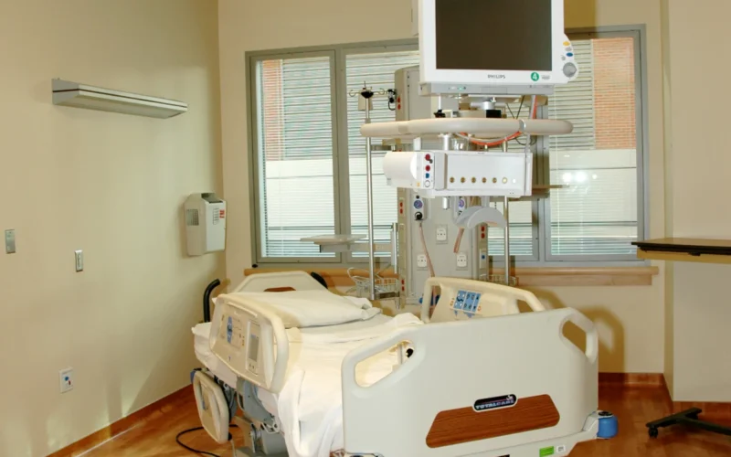 Title Patient Room with Hospital Bed Description A single empty hospital bed in a patient room, located in the Clinical Research Center, National Institutes of Health (NIH), Bethesda, Md. Topics/Categories Locations, Clinic/Hospital Locations, NIH Type Color, Photo Source National Cancer Institute