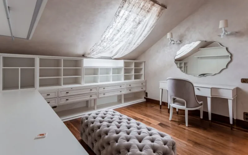 Spacious vanity room with elegant furniture and a soft, natural light ambiance.