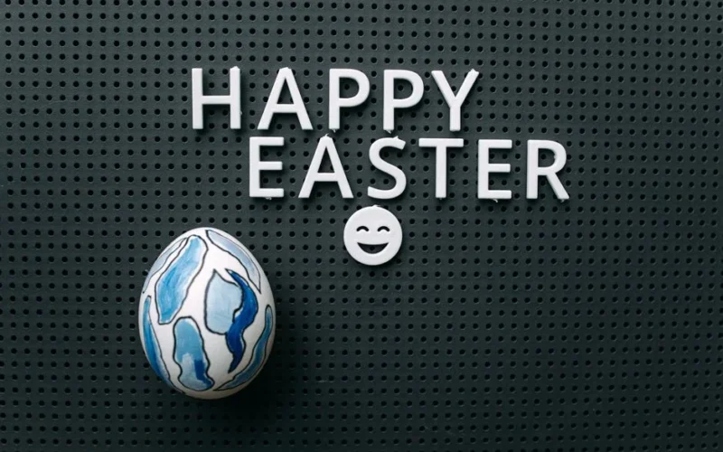Decorative Easter egg and message on letter board celebrating Easter.