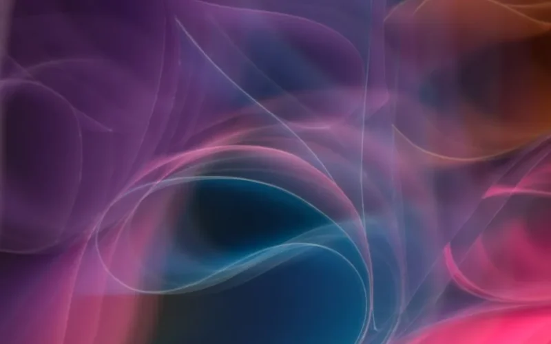 Colorful abstract light patterns creating a vibrant flow of motion.